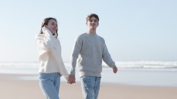 Young Couple Warm Sweaters Enjoying Romantic Walk Empty Beach Talking — Stock Video