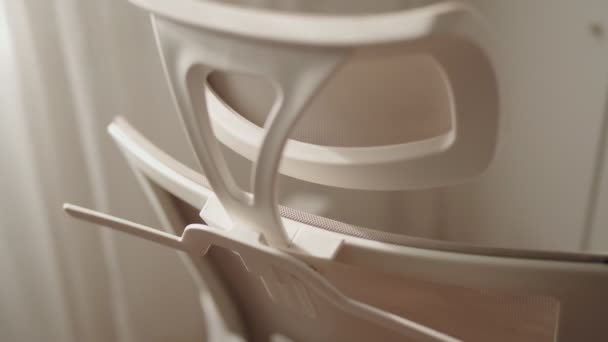 Closeup Minimalist White Office Chair Headrest Symbolizing Premium Design Modern — Stock Video