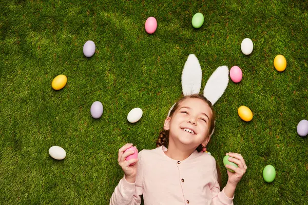 Little Girl Wearing White Bunny Ears Lying Green Grass Easter Stock Photo