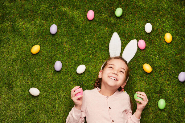 Little Girl Wearing White Bunny Ears Lying Green Grass Easter Royalty Free Stock Images