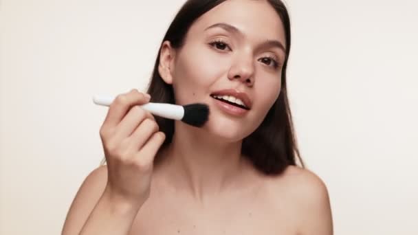 Young Attractive Woman Smiling She Applies Blush Makeup Brush Studio — Stock Video