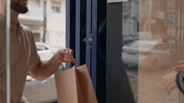 Hands Exchanging Paper Bag Courier Delivers Food Order Customer Home — Stock Video