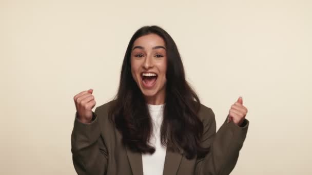 Portrait Joyful Young Businesswoman Win Gesture Expressing Happiness Success Beige — Stok Video