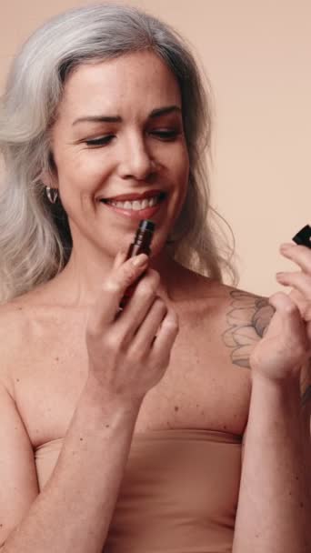 Close View Senior Woman Revealing Shoulder Tattoo Embodying Elegance Confidence — Stock Video