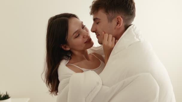 Intimate Moment Couple Love Embracing Romantic Affection Covered White Sheet — Stockvideo