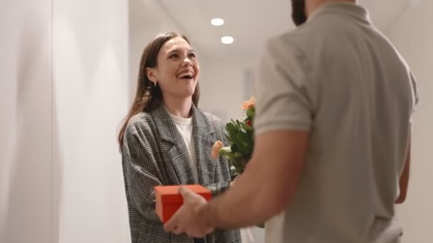 Smiling Young Woman Receiving Bouquet Gift Box Delivery Service Expresses — стоковое видео