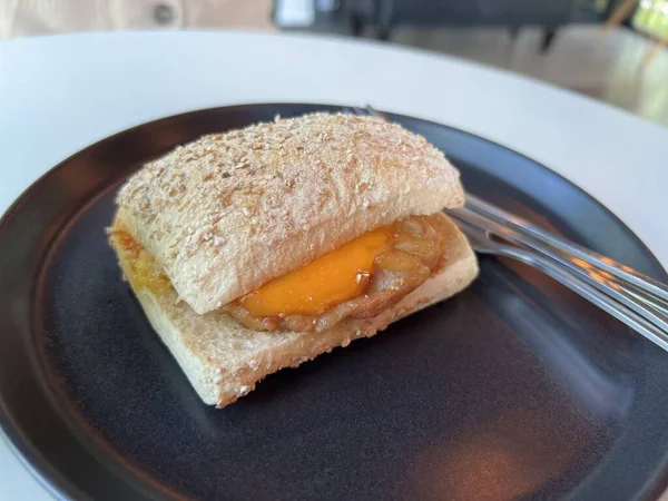 Cheer Busta Grillpork Sandwich food , Homemade Pork Sandwich with Ham Cheese and Mustard.
