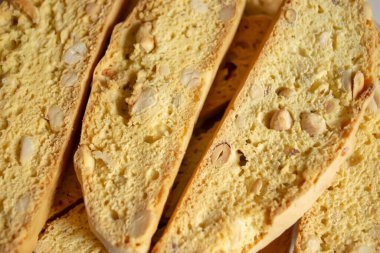 Biscotti with a close-up of peanuts. Barely as a background - biscotti. Fresh biscotti lies on a slide.
