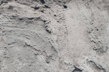 Beton harç ve kum dokusu. Çimentoyla monokrom karışımı yapıştır. Dekorasyon ve tasarım için desenli arkaplan.