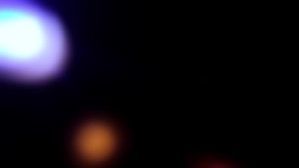 Мерцающие Разноцветные Лампочки Черном Фоне Размытые Огни Видеоэффект Вспышки — стоковое видео