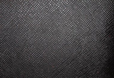 Desenli siyah deri, moda tasarımı veya iç dekorasyon projeleri için ideal bir zemin oluşturarak eşsiz modellerini ön plana çıkarır..