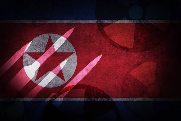 朝鲜国旗具有核导弹标志和磨擦纹理效果 朝鲜原子武器概念背景 — 图库照片