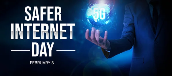 Safer Internet Day Wallpaper with glowing globe in the hand of a businessman. Internet day backdrop.