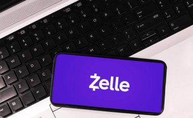 Online Digital payment service provider zelle editorial background with mobile