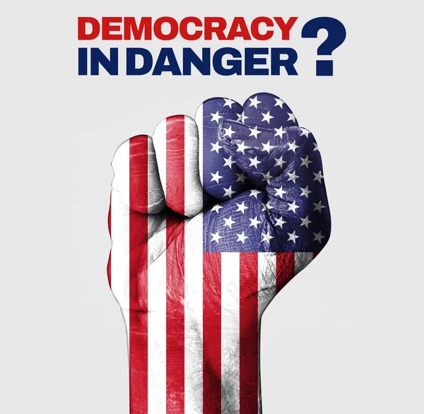 Democracy in danger poster design with a question mark and painted fist. American flag painted on a fist with typography