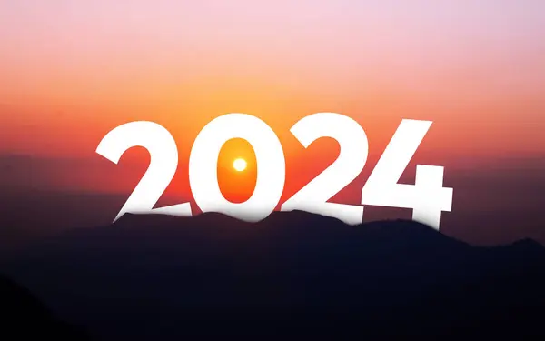 2024 typography behind the mountains with a sun background. New year 2024 sun with mountains wallpaper