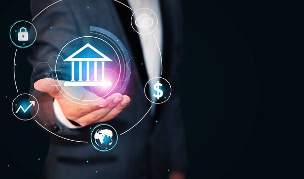 Концепция банковского дела и финансов, когда банк нависает над человеком. Человек с футуристическим дизайном банка светится огнями, копия пространства сбоку