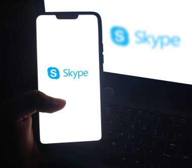 Seamless Communication with Skype on Mobile Screen, Hand Touching for Instant Video Calls and Messaging Anytime, Anywhere