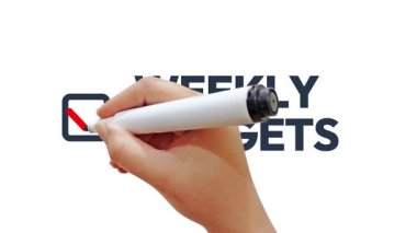 Haftalık hedef tipografisi boyunca işaretli kutunun üzerinde işaretli bir el işareti, 4K görüntü. Hedef başarılı, kontrol listesi ögesi