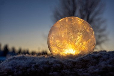 Frozen soap bubble. Patterns on a frozen soap bubble. Photo