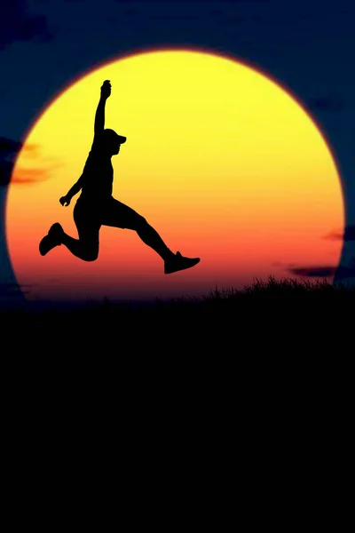 Vertical silhouette of a man jumping to the future. The concept of moving on to something better