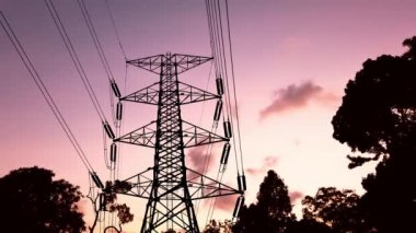 High voltage transmission towers in the evening. electric power concept