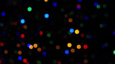Christmas colorful bokeh on black background