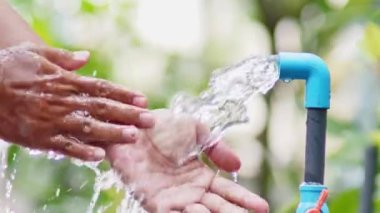 Clean water for life. Man washing hands. Good water management makes water available forever.