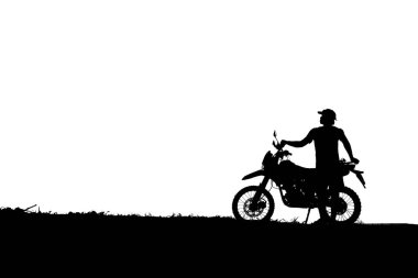 Motosikletli bir adamın silueti. 