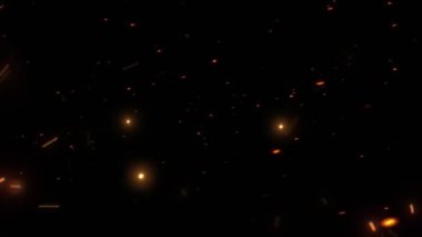 Hareket halindeki parçacıklar. Noel ışıkları arka planı. Gecenin karanlığında siyah bir arkaplanda yangın