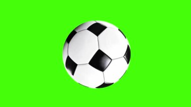 Yeşil ekran arka planında dönen bir futbol topunun canlandırması.