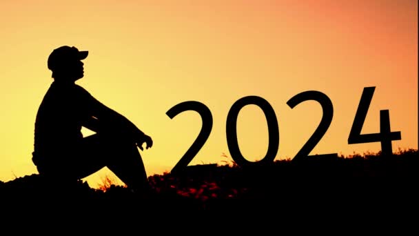絶望的で孤独な2024年の新年のシルエット — ストック動画