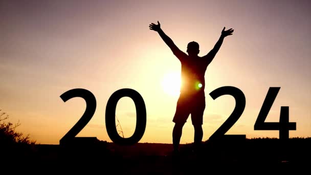 Silhouette Happy Man Raising His Hands 2024 Sign Happy New — Stock Video