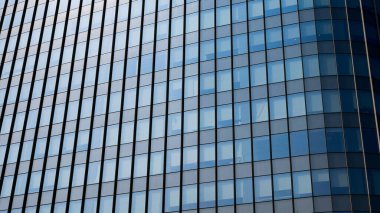 çağdaş gökdelen mavi cam pencereli, modern bina dış tasarımı