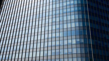 çağdaş gökdelen mavi cam pencereli, modern bina dış tasarımı