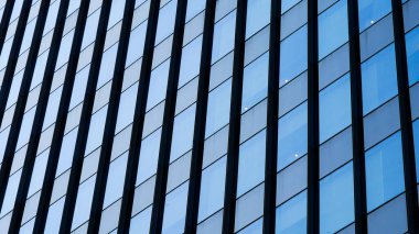 çağdaş gökdelen mavi cam pencereli, modern bina dış tasarımı