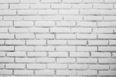 Beyaz tuğla bir duvarın yüksek çözünürlüklü görüntüsü, çeşitli yaratıcı projelerde arka plan, doku ve tasarım unsurları için mükemmel..