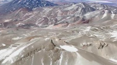 Aerial view of an active volcano orbiting around the peak Nature rock Crater