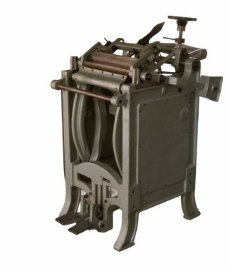 Eski günlerden kalma bir nane basım evinde kullanılan antika bir baskı makinesi.