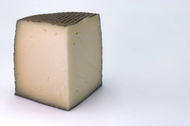 Beyaz üzerine sarı peynir, balmumu kaplamalı.