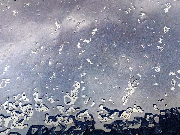 Islak araba gövdesinden yapılmış güzel bir arka plan