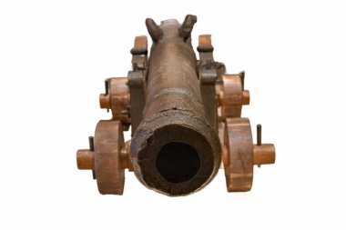 A large cannon rests on wooden wheels, highlighting its historical craftsmanship. The rusted metal and sturdy wheels reflect traditional artillery design from past eras.