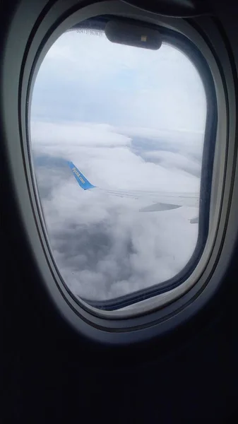 View to the clouds from the airplane