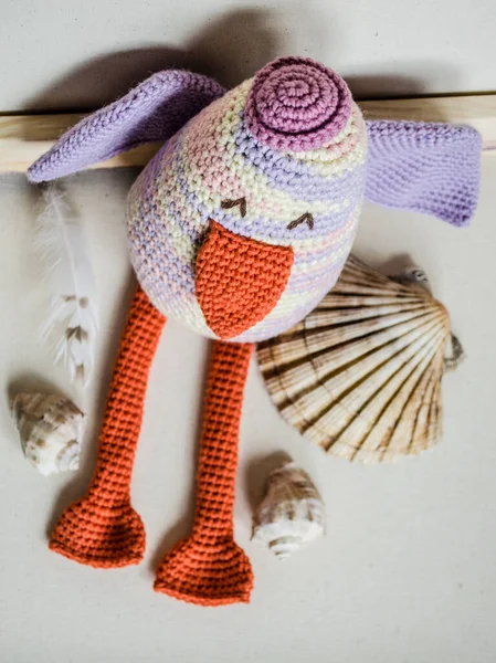 Crocheted toy bird seagull and shells. Sea motif handmade decor.