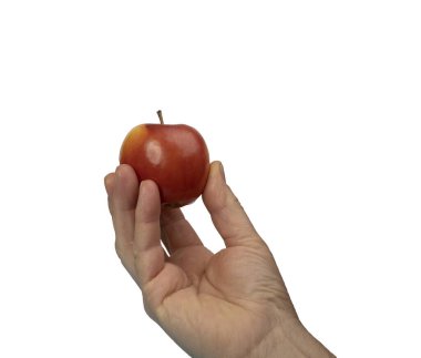 Şeffaf bir arkaplanda küçük bir elma olan bir erkek el.