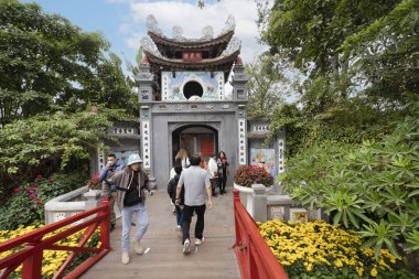 Hanoi, Vietnam, January 2023.  view of Ngoc Son Temple, Confucian temple on the Hoan Kiem lake crossed by a bridge, with tower and pavilions dedicated to the national hero.
