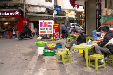 Hanoi, Vietnam, January 2023.  a street food restaurant in the city center