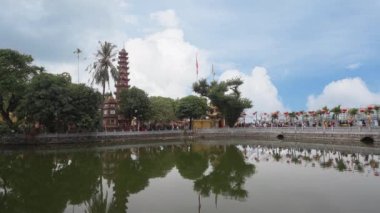 Hanoi, Vietnam, January 2023. the faithful within the Tran Quoc Pagoda, the oldest Buddhist temple in Hanoi, is located on a small island near the southeastern shore of Hanoi's West Lake.