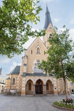 Villach, Austria. July 18 2023. the exterior facade of the Church of St. Nicholas in the city centre