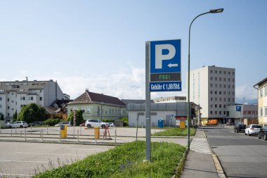 Villach, Austria. July 18 2023. the paid parking sign with the free spaces indicated in a street in the city centre